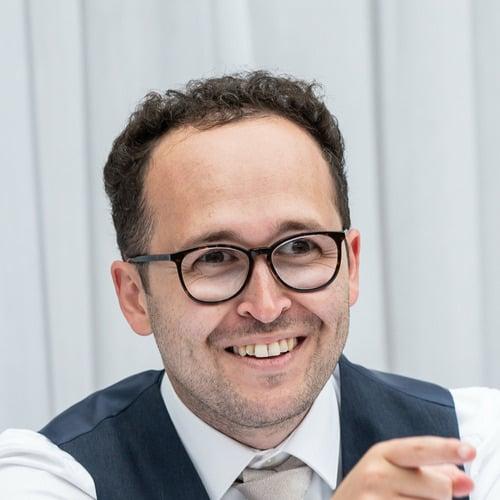 Charlie B. || item.role}